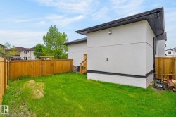 Lawn area with new wood fencing and gate - 