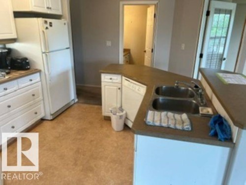 415 10951 124 Street, Edmonton, AB - Indoor Photo Showing Kitchen With Double Sink