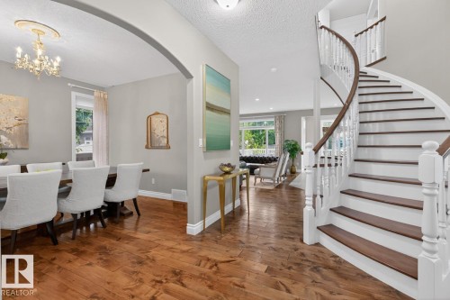 Entrance leading to Grand Curved Staircase, and Formal Dining Room - 5016 213 Street, Edmonton, AB 
