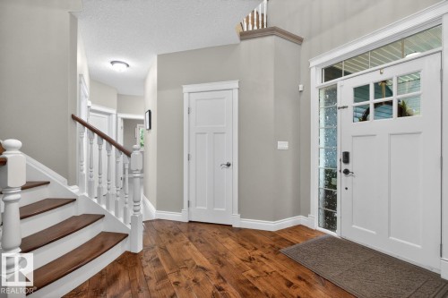 Entrance leading to Grand Curved Staircase, and Formal Dining Room - 5016 213 Street, Edmonton, AB 