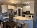 7028 174 Avenue, Edmonton, AB  - Indoor Photo Showing Kitchen With Stainless Steel Kitchen 
