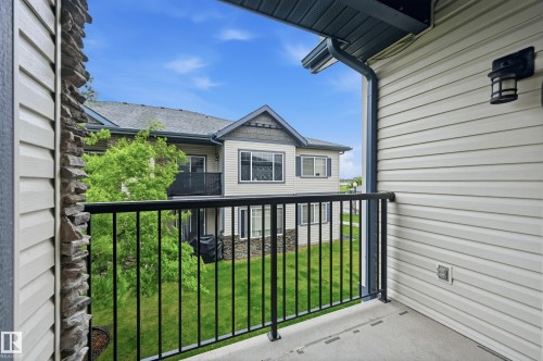 Private balcony featuring a black metal railing and concrete flooring - 50 2565 Hanna Crescent, Edmonton, AB 