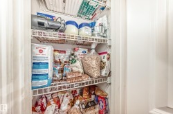 Pantry with white wire shelving - 