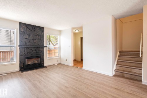 18439 66 Avenue, Edmonton, AB - Indoor Photo Showing Living Room With Fireplace
