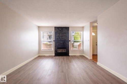 18439 66 Avenue, Edmonton, AB - Indoor Photo Showing Living Room With Fireplace