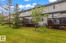 Expansive green lawn providing a natural backdrop to the property - 