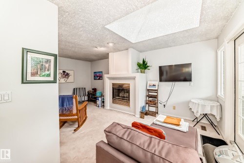 11650 103 Avenue, Edmonton, AB - Indoor Photo Showing Living Room With Fireplace