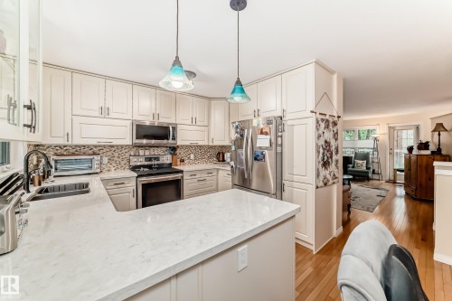 11650 103 Avenue, Edmonton, AB - Indoor Photo Showing Kitchen With Double Sink With Upgraded Kitchen
