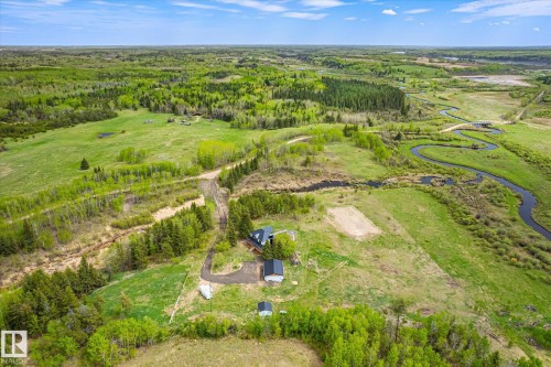 Expansive property featuring a winding river, mature trees, and open green spaces - 59102 Rge Road 234, Rural Westlock County, AB 