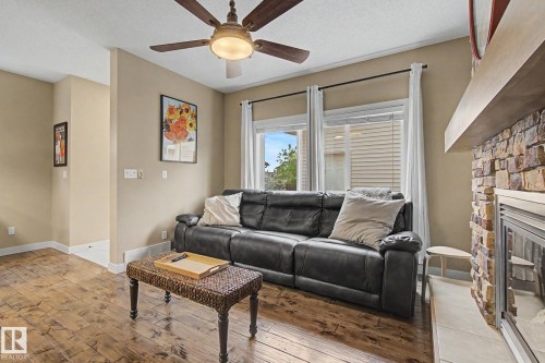 9704 221 St, Edmonton, AB - Indoor Photo Showing Living Room With Fireplace