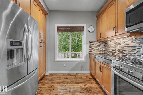 9704 221 St, Edmonton, AB - Indoor Photo Showing Kitchen With Stainless Steel Kitchen With Upgraded Kitchen