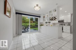 Your breakfast nook boasts a newer patio door to the huge 2-tier deck - 