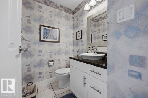Renovated (2023) 2-pce main floor bath with marble top, a white vessel sink and ceramic tile flooring - 31 Wentworth Crescent, St. Albert, AB - Indoor Photo Showing Bathroom