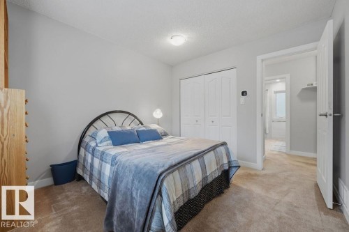 One of four additional bedrooms on the upper level - 31 Wentworth Crescent, St. Albert, AB - Indoor Photo Showing Bedroom