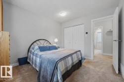 One of four additional bedrooms on the upper level - 