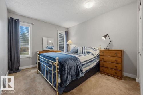 One of four additional bedrooms on the upper level - 31 Wentworth Crescent, St. Albert, AB - Indoor Photo Showing Bedroom