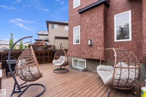 Spacious outdoor deck featuring wood-finish planks - 16609 58A Street, Edmonton, AB 