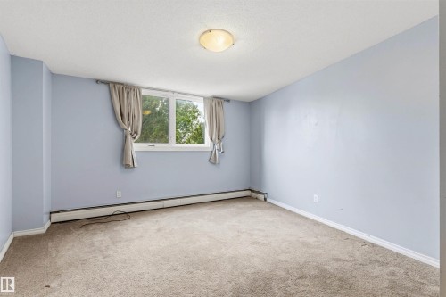 303 10045 117 Street, Edmonton, AB 