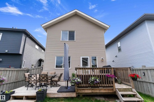 Exterior featuring a rear wooden deck and steps - 6822 Cardinal Link, Edmonton, AB 