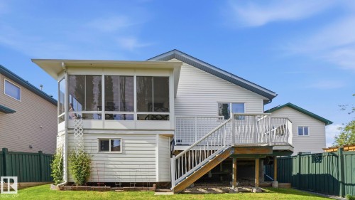 Rear exterior showcasing a screened-in sunroom with extensive windows - 856 Graham Wynd, Edmonton, AB 