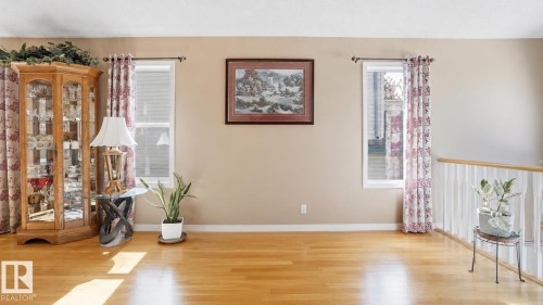 Warm wood-finish flooring throughout - 856 Graham Wynd, Edmonton, AB 