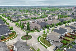 Expansive aerial perspective showcasing a residential development with numerous single-family homes - 