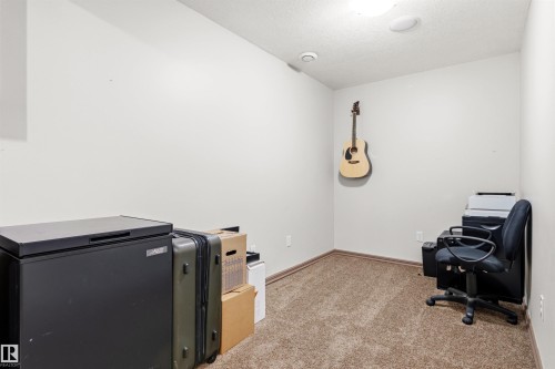 Neutral wall color, wall-to-wall carpeting, and recessed ceiling lighting - 14807 141 Street, Edmonton, AB 
