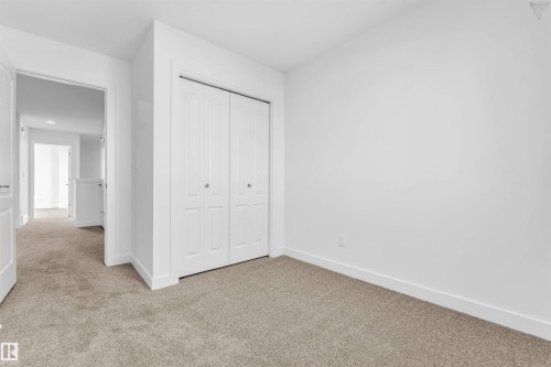 Neutral-toned carpeting throughout - 1224 14 Avenue Nw, Edmonton, AB - Indoor