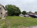Expansive grass lot featuring mature trees and a paved sidewalk - 10737 95 Street, Edmonton, AB 