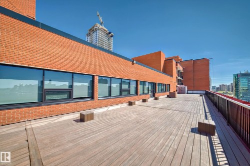 Expansive rooftop deck featuring wood-finish flooring - 706 10125 109 Street, Edmonton, AB 