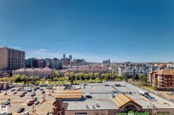 Skyline views featuring distant high-rise buildings and surrounding urban architecture - 