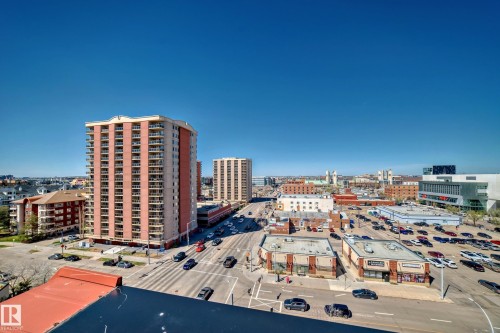 High-rise residential building featuring multiple balconies and a brick facade - 706 10125 109 Street, Edmonton, AB 