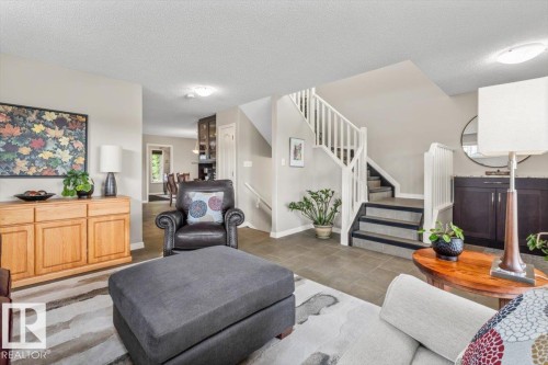 Open-concept living space with tiled flooring - 1086 Grantham Drive, Edmonton, AB 