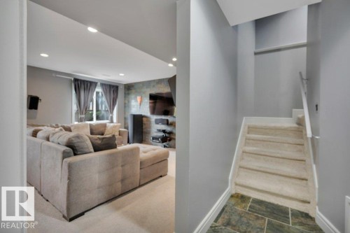 Fully finished, looking toward family room and West facing walkout - 10 15151 43 Street, Edmonton, AB - Indoor Photo Showing Other Room