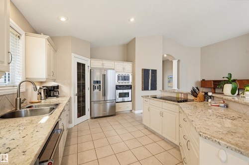 28 Prestige Point(E), Edmonton, AB - Indoor Photo Showing Kitchen With Double Sink