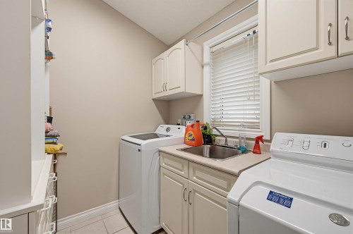 28 Prestige Point(E), Edmonton, AB - Indoor Photo Showing Laundry Room