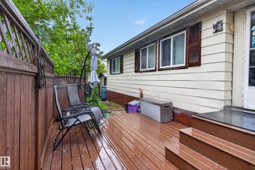 Expansive wood-finish deck with a privacy fence - 21 Willowdale Drive, Edmonton, AB - Outdoor With Deck Patio Veranda With Exterior