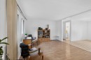 Bright interior featuring large windows, wood-finish flooring, and white walls - 21 Willowdale Drive, Edmonton, AB  - Indoor 