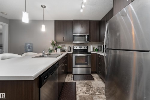 115 3670 139 Avenue, Edmonton, AB - Indoor Photo Showing Kitchen With Double Sink