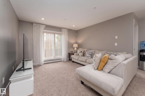 115 3670 139 Avenue, Edmonton, AB - Indoor Photo Showing Living Room