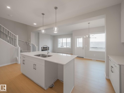 19430 22A Avenue, Edmonton, AB - Indoor Photo Showing Kitchen With Double Sink