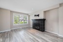 2914 18A Avenue, Edmonton, AB  - Indoor Photo Showing Living Room With Fireplace 