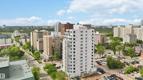 White high-rise building featuring multiple balconies and windows - 901 10504 99 Avenue, Edmonton, AB 