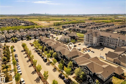 Aerial perspective showcasing a residential development with varied housing styles - 4013 Blackbird Link, Edmonton, AB 