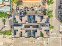 Multi-level building featuring multiple rooftop patio spaces - 