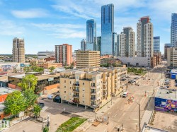 Elevated city landscape featuring multiple high-rise buildings and contemporary architecture - 
