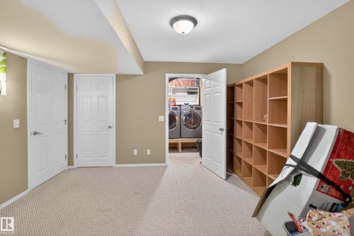 Carpeted flooring, recessed lighting, and a neutral wall color create a versatile space - 8 Vega Avenue, Spruce Grove, AB - Indoor Photo Showing Other Room