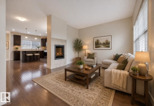908 Valour Way, Edmonton, AB - Indoor Photo Showing Living Room With Fireplace