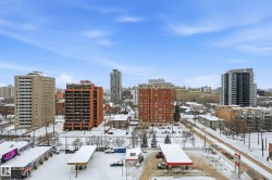 Urban skyline featuring multiple high-rise buildings and commercial structures - 