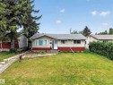 Ranch-style exterior with a stucco and horizontal panel facade - 5216 104A Street, Edmonton, AB  - Outdoor 